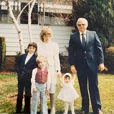 Cheryl Scott uploaded a throwback photo of herself with her parents and brothers.