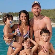 Antonella with her husband and a child