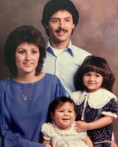 Anjelah Johnson shared a throwback photo with her parents and sister.