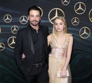 Naiia-Rose-Ulrich-with-her-father-at-an-event