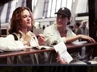 Eliza and Brandon at an airport in 1992.