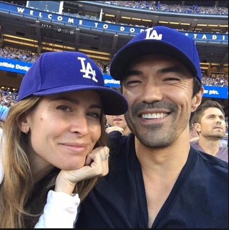 Nicole and Ian wearing LA Dodgers, Image source: celebrity facts
