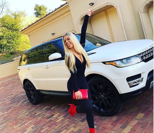 Kaylyn posing in front of her car. source: Instagram
