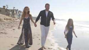 Shane with his partner, Giada, and daughter, Jade Image Source: People