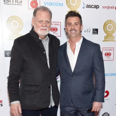 Alex Hackford with his father in an event. Image source: Zimbio