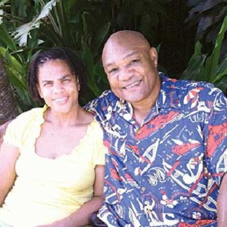 Mary Joaan Martelly and George Foreman Image Source: Biography Talks