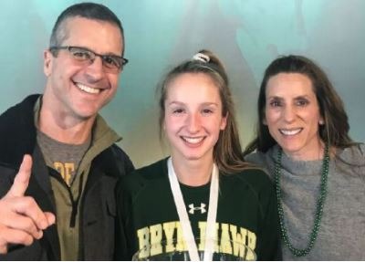Alison Harbaugh with her parents John Harbaugh and Ingrid Harbaugh. Source: ESPN