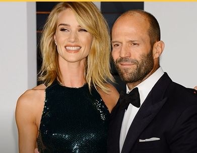 Barry Statham's son Jason Statham with his fiance Rosie Huntington–Whiteley. Source: YouTube