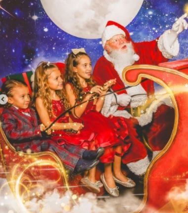 Her children with Santa Claus on Christmas Day Source: Instagram
