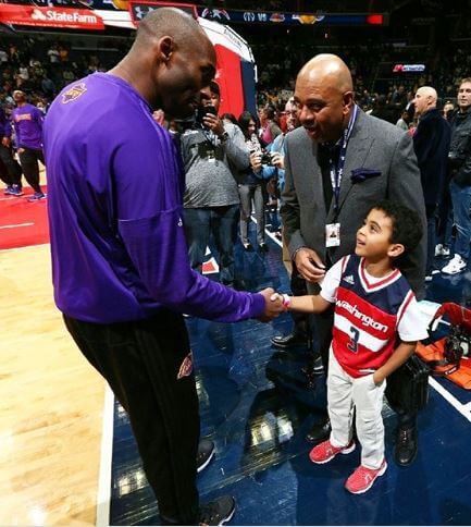 Sheryl Wilbon's son shaking hand with Kobe Bryant. Source: Instagram