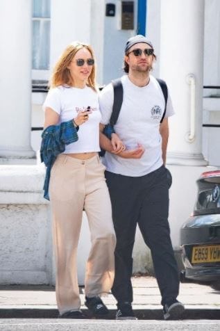 Victoria Pattinson's Brother, Robert Pattinson with his girlfriend, Suki Waterhouse. Source: elle.com