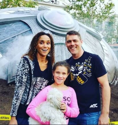 Karyn Bryant's husband and their daughter SOURCE: Instagram @kbheat