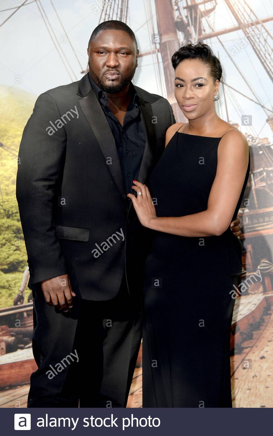  Alamy Nonso Anozie and guest arrives at the world premiere of Pan at the Odeon, Leicester Square, London Stock Photo - Alamy