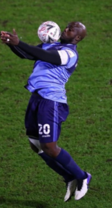 Adebayo Akinfenwa playing football
