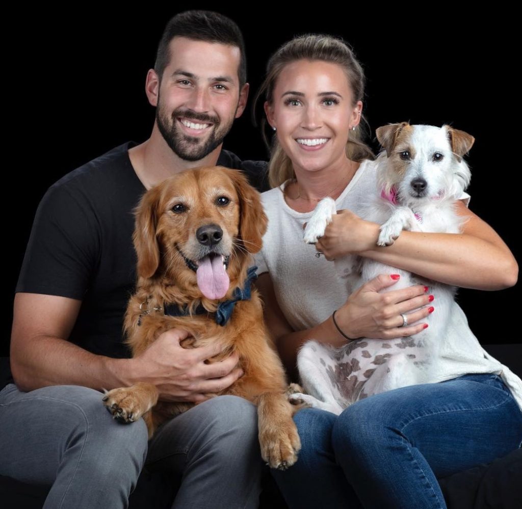 Brandon McManus with his wife and two dogs